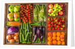 Fruit and vegetables in boxes by Assaf Frank
